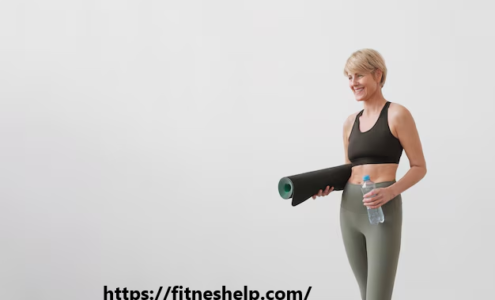 a woman holding a yoga mat